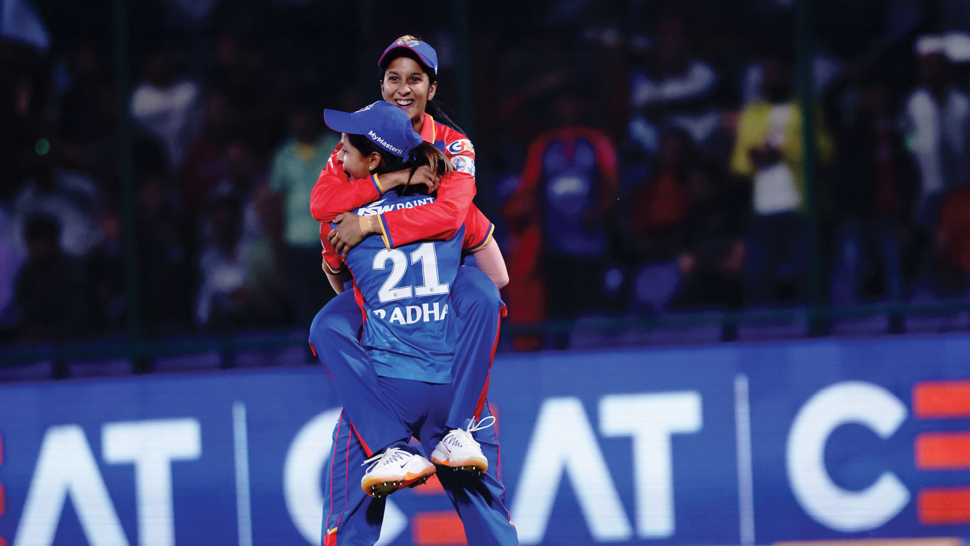 Jemimah Rodrigues and Radha Yadav celebrate a wicket