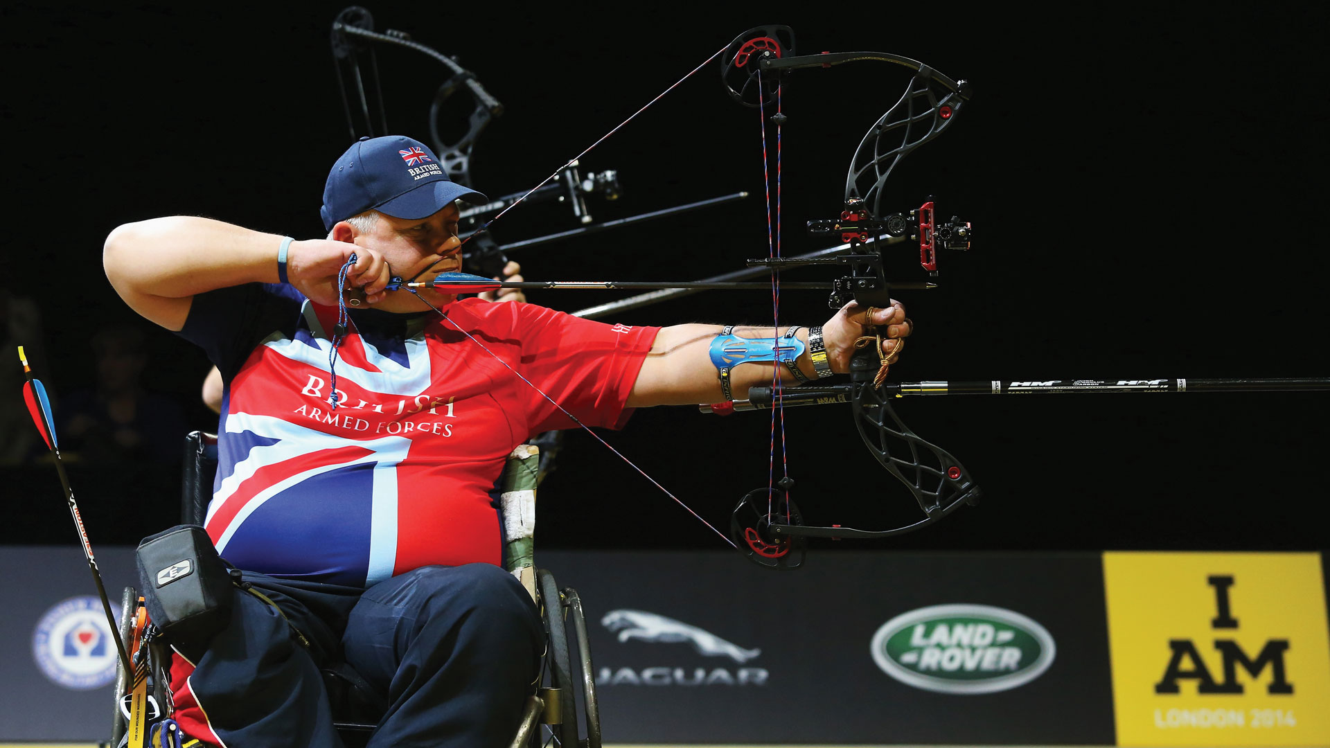 A veteran archer takes aim