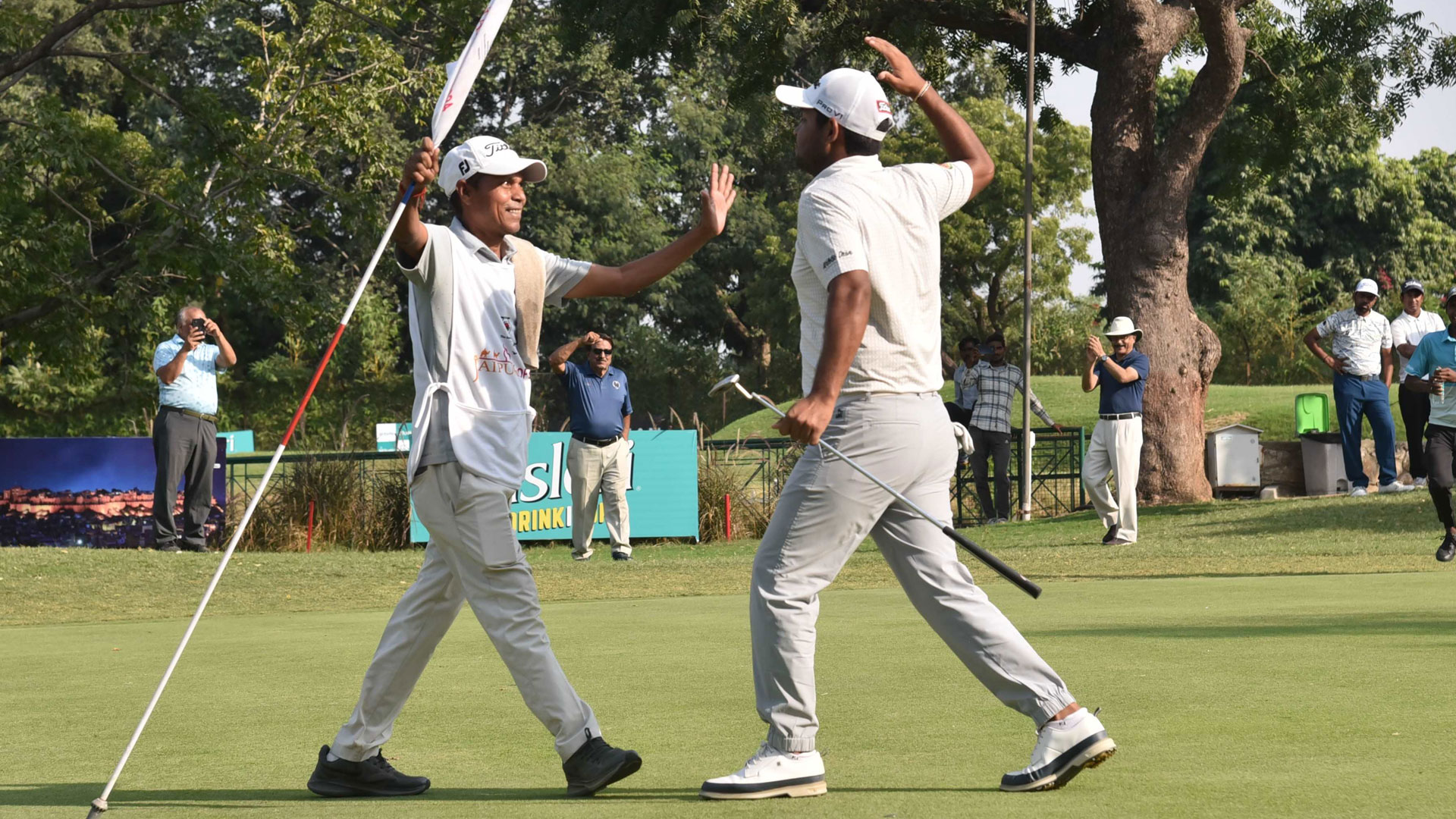 Sachin Baisoya celebrating with his caddie